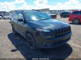 ������ Jeep Cherokee