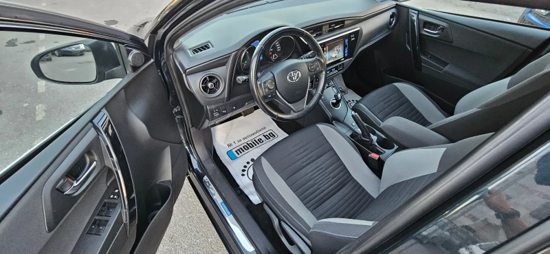 Toyota Auris 1.8 Hybrid e-CVT Lounge, снимка 11 - Автомобили и джипове - 48979415
