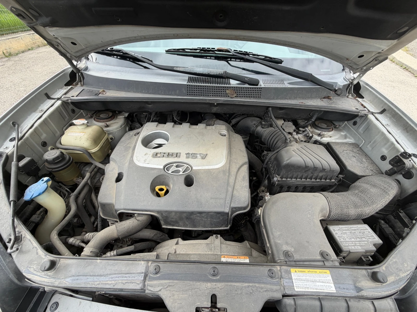 Hyundai Tucson 2.0 CRDI, снимка 16 - Автомобили и джипове - 54544898