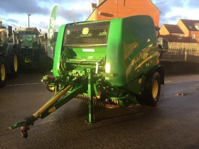      John Deere 990-,  