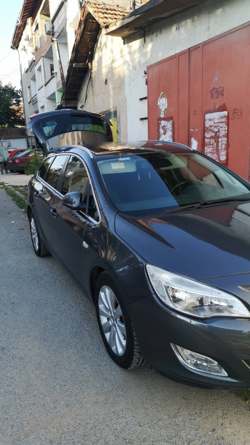 Opel Astra 1.3 CDTI, снимка 8 - Автомобили и джипове - 46415306