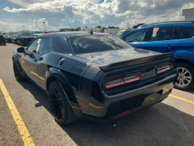Обява за продажба на Dodge Challenger * SCAT PACK 392 * CARFAX * БЕЗ ПЪРВОНАЧАЛНА ВНОСКА ~93 600 лв. - изображение 2 | Auto.bg Обява за продажба на Dodge Challenger * SCAT PACK 392 * CARFAX * БЕЗ ПЪРВОНАЧАЛНА ВНОСКА ~93 600 лв. - изображение 2