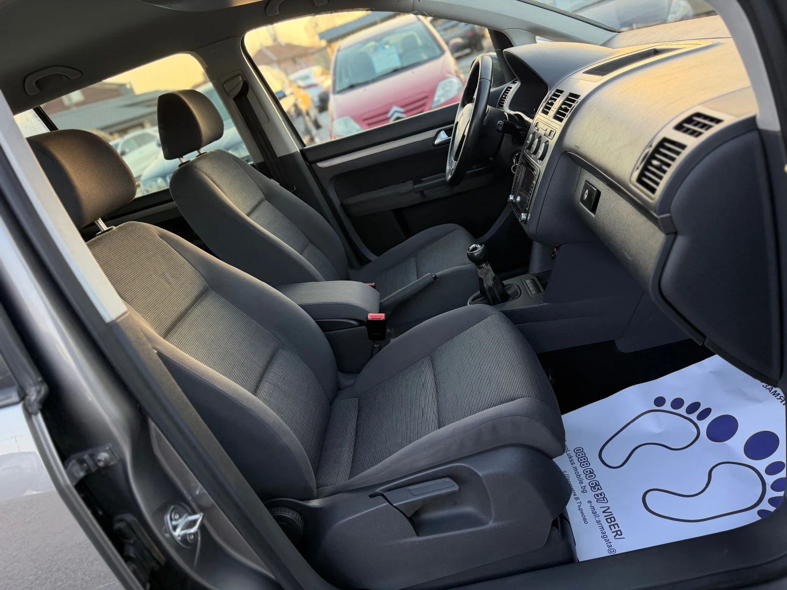 VW Touran 1.9TDI 105кс 6с 7-места КЛИМАТРОНИК НАВИ , снимка 14 - Автомобили и джипове - 53872080