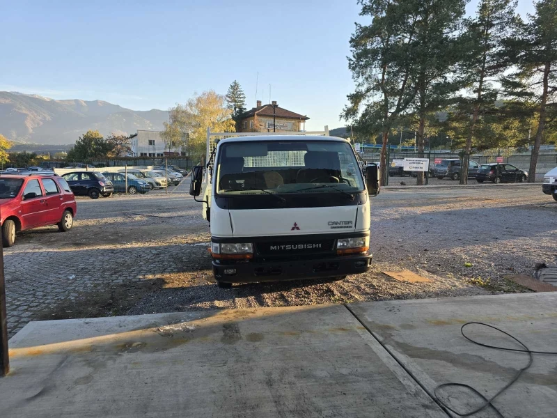 Mitsubishi Canter 3.0D* климатик* двойна гума* 3-странен самосвал* , снимка 3 - Бусове и автобуси - 52257035