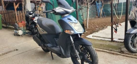 Kymco Agility Става за А1 много лек икономичен и пъргав скутер, снимка 1