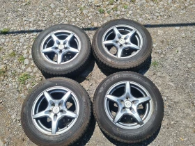        195/65R15  Subaru Impreza