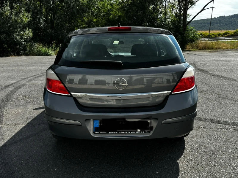 Opel Astra 1.6 Twinport, снимка 7 - Автомобили и джипове - 53530963