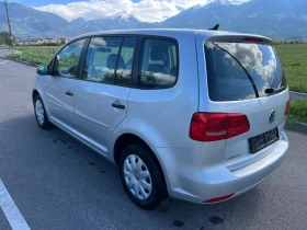 VW Touran 1.6 TDI // Нави // Клима // Парктроник - 11999 лв. - 54038902 7