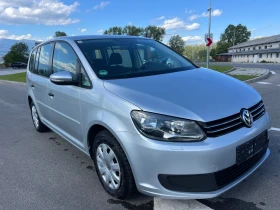 VW Touran 1.6 TDI // Нави // Клима // Парктроник - 11999 лв. - 54038902 3