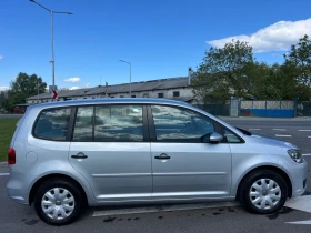 VW Touran 1.6 TDI // Нави // Клима // Парктроник - 11999 лв. - 54038902 4