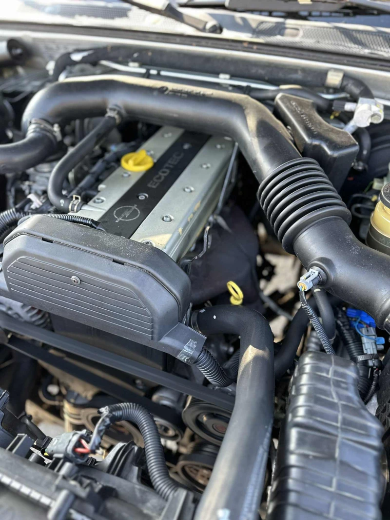 Opel Frontera 2.2 бензин Кожа , климатик , снимка 10 - Автомобили и джипове - 51255759