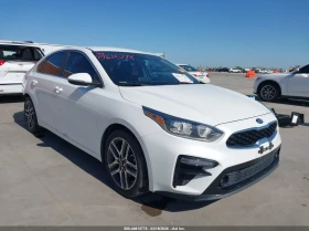 ������ Kia Forte
