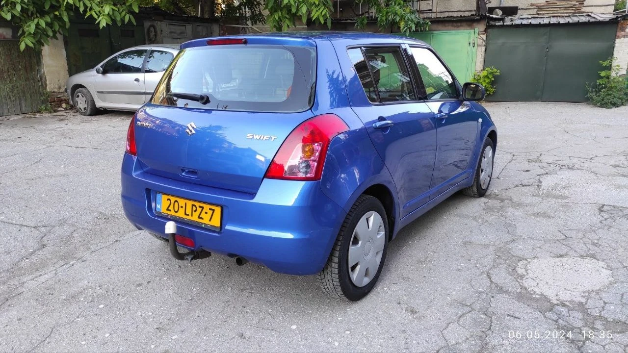 Suzuki Swift 1.3 - изображение 4