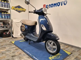     Vespa 50 LX 49cc.