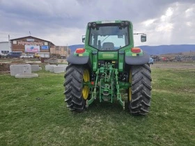      John Deere 6520