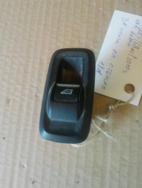 Копче ел стъкло задно дясно Форд Фиеста 4вр. 10г.