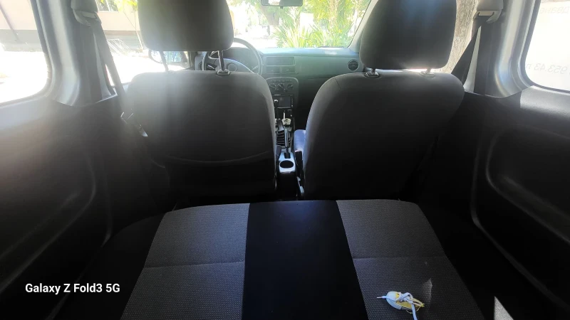 Daihatsu Cuore, снимка 8 - Автомобили и джипове - 52323457