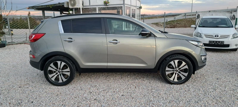 Kia Sportage 2.0 CRDI 4x4 Navi Кожа Панорама, снимка 8 - Автомобили и джипове - 53047188