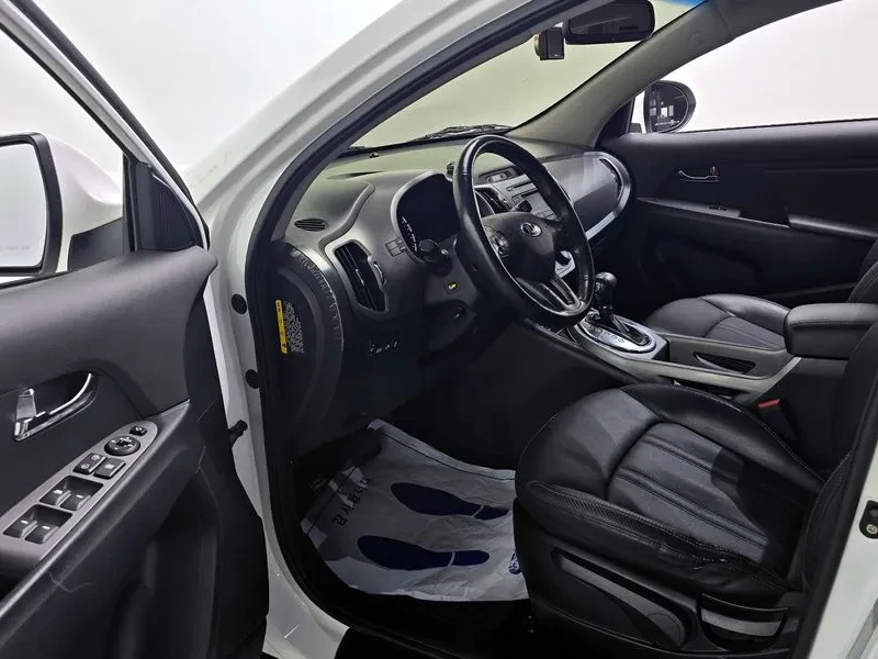 Kia Sportage 2.0 CRDi 4WD, снимка 10 - Автомобили и джипове - 54274971