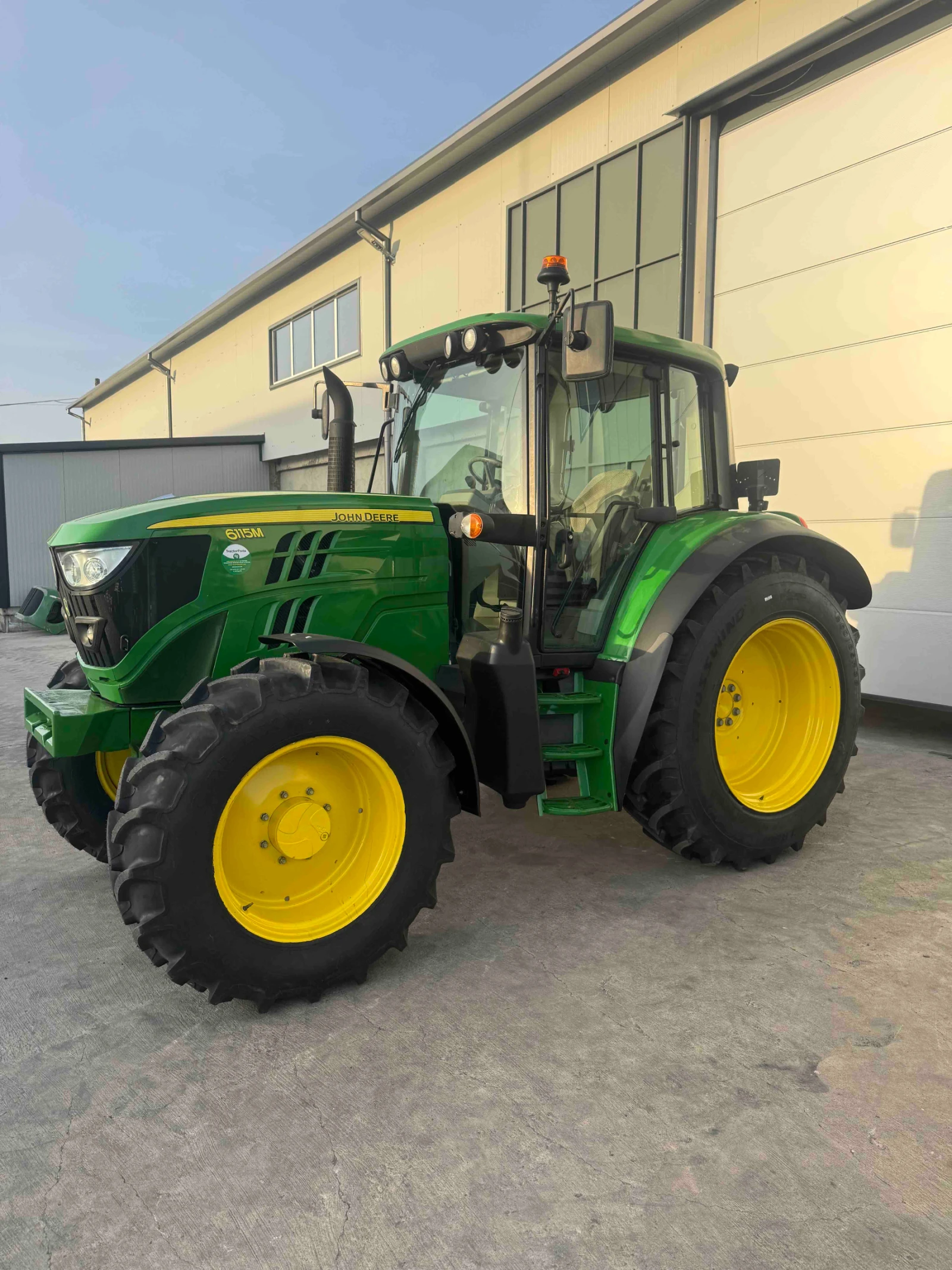 Трактор John Deere 6115M - лизинг
