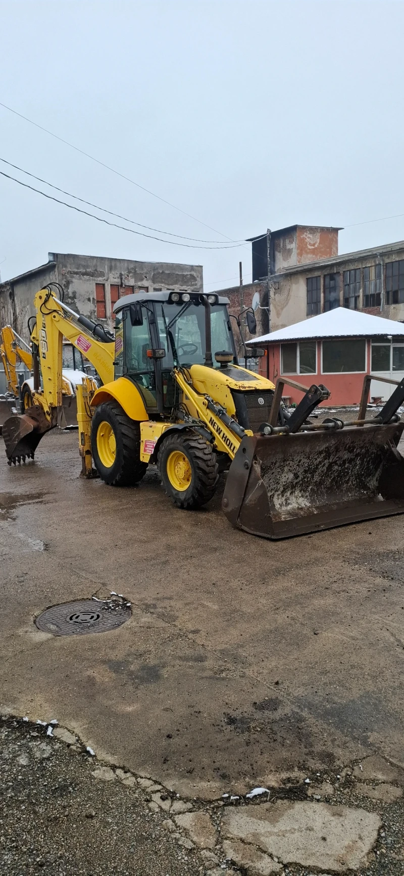 Багер New Holland B90