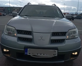 Mitsubishi Outlander 2.4 Mivek 160к.с 4х4 - 3700 € / 7236.57 лв. - 10543414 8