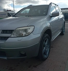 Mitsubishi Outlander 2.4 Mivek 160к.с 4х4 - 3700 € / 7236.57 лв. - 10543414 7