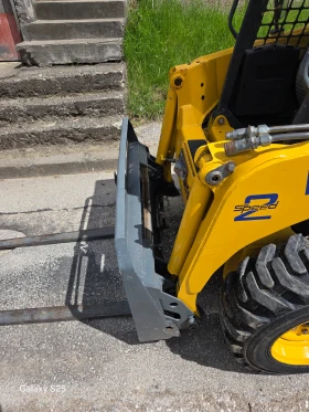 Мини челни товарачи Komatsu SK 714, снимка 8