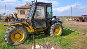 Телескопичен товарач JCB 528-70, снимка 1