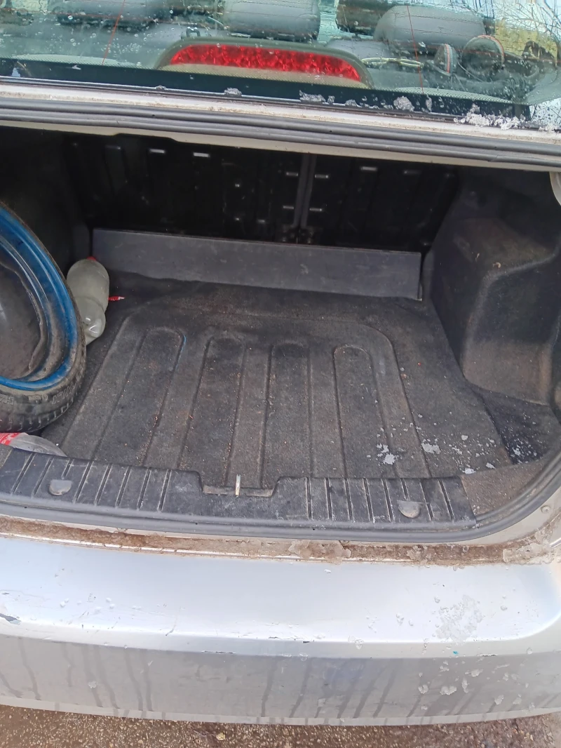 Chevrolet Aveo 1.2, снимка 12 - Автомобили и джипове - 53189908