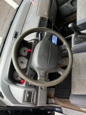 Mitsubishi Space runner 1.8 136 кс. 4х4 газ бензин климатик, снимка 9