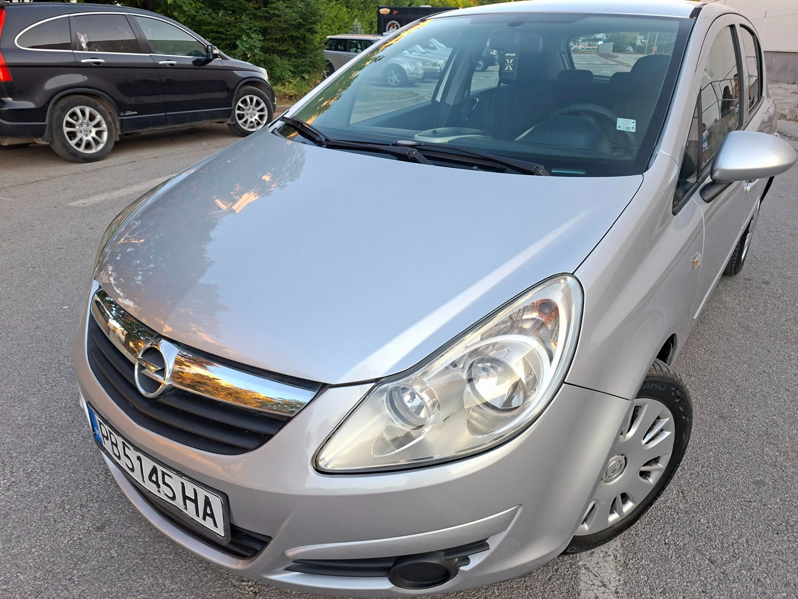 Opel Corsa 1.2 Клима, снимка 12 - Автомобили и джипове - 55790304