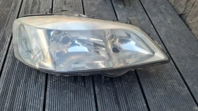 Фар Opel Astra G 01г десен Hella, снимка 1 - Части - 48797552