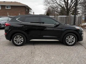 Hyundai Tucson Luxury  CARFAX - 11550 € / 22589.84 лв. - 46069665 3