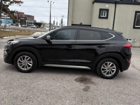 Hyundai Tucson Luxury  CARFAX - 11550 € / 22589.84 лв. - 46069665 2