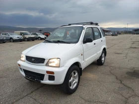 Daihatsu Terios 1.3 I 4x4 &#39;КЛИМАТИК&#39;, снимка 1