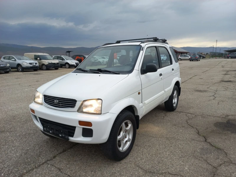 Daihatsu Terios 1.3 I 4x4 &#39;КЛИМАТИК&#39;, снимка 1 - Автомобили и джипове - 49548680