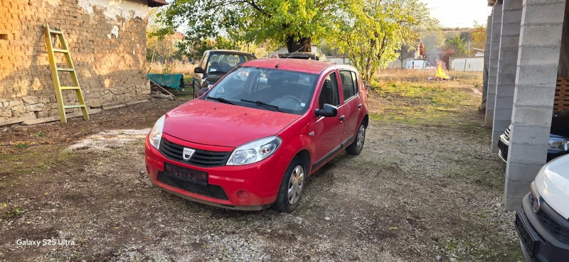 Dacia Sandero 1.4i, снимка 11 - Автомобили и джипове - 52239509