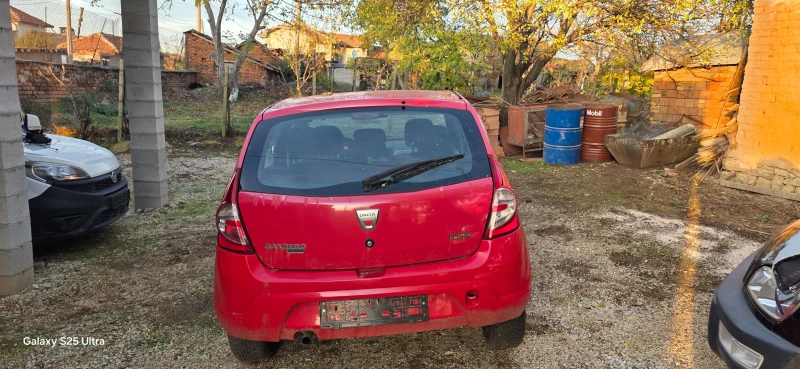 Dacia Sandero 1.4i, снимка 13 - Автомобили и джипове - 52239509