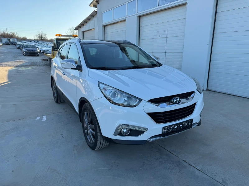 Hyundai IX35 2.0crdi * 4x4* Navi* PANORAMA* UNIKAT* , снимка 11 - Автомобили и джипове - 48411271