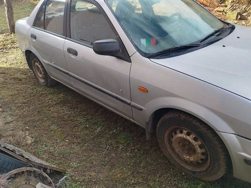 Mazda 323, снимка 1 - Автомобили и джипове - 48763185