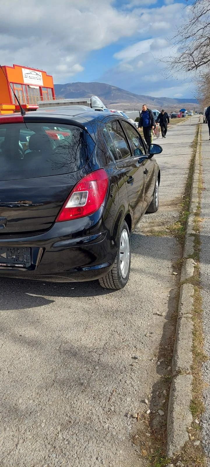 Opel Corsa 1.3 cdti клима, снимка 6 - Автомобили и джипове - 43989511