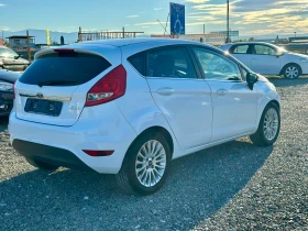 Ford Fiesta 1.4i* TiTANIUM* LPG*  - 8600 лв. / 4397.11 € - 21399540 4