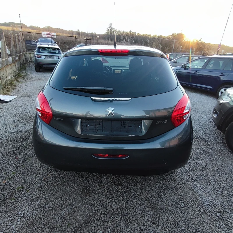 Peugeot 208 1.2i* NAVI* 82кс* EURO 5b* , снимка 7 - Автомобили и джипове - 52713211