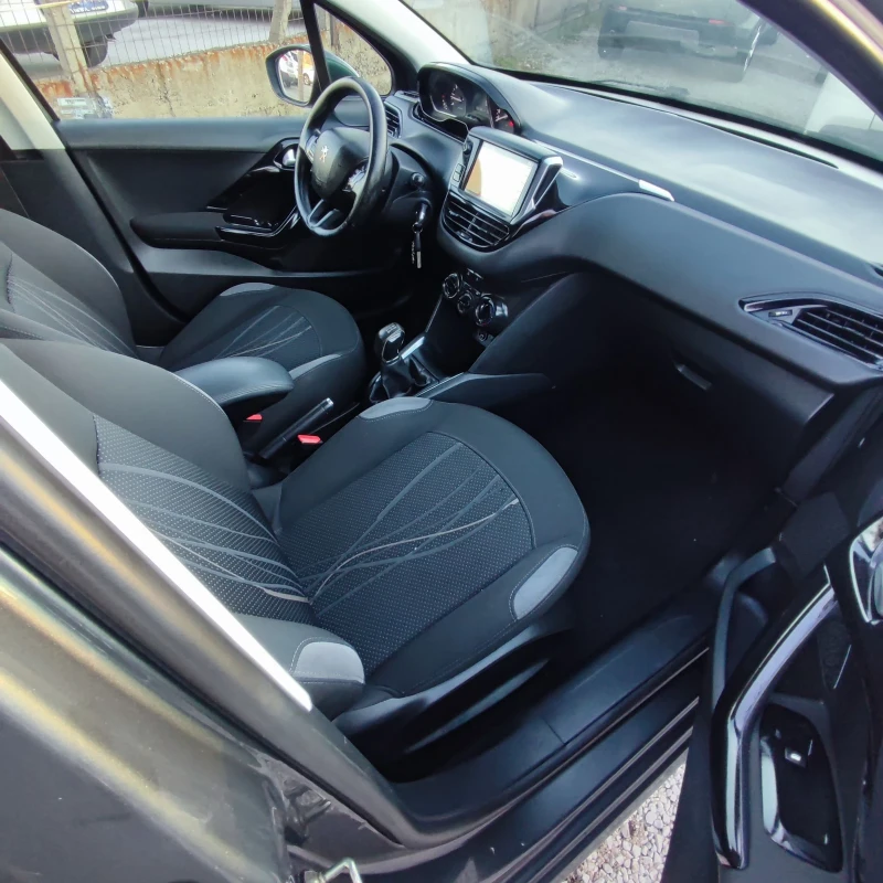 Peugeot 208 1.2i* NAVI* 82кс* EURO 5b* , снимка 11 - Автомобили и джипове - 52713211