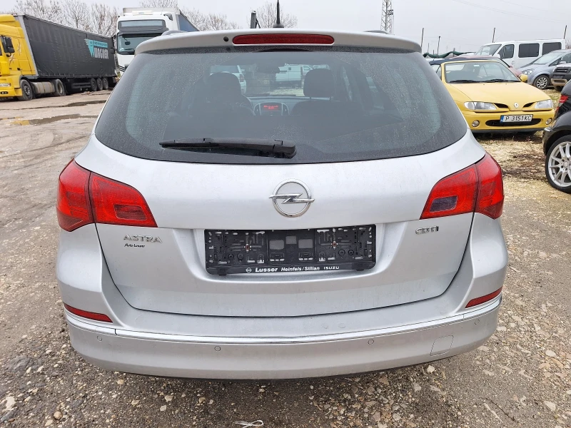 Opel Astra 1, 6TDCI Като нова!!!, снимка 5 - Автомобили и джипове - 48214339