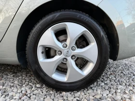 Kia Carens 2.0ISG Style - 166k.c. - 7места, снимка 15