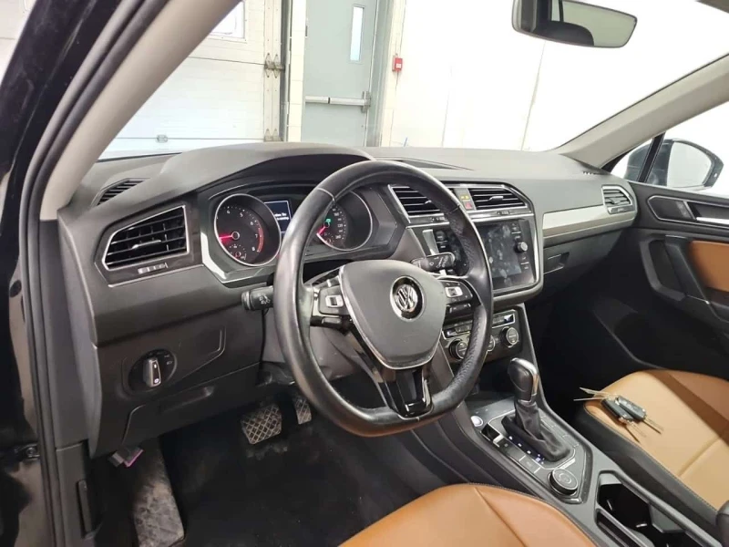 VW Tiguan COMFORTLINE  CARFAX, снимка 10 - Автомобили и джипове - 53600373