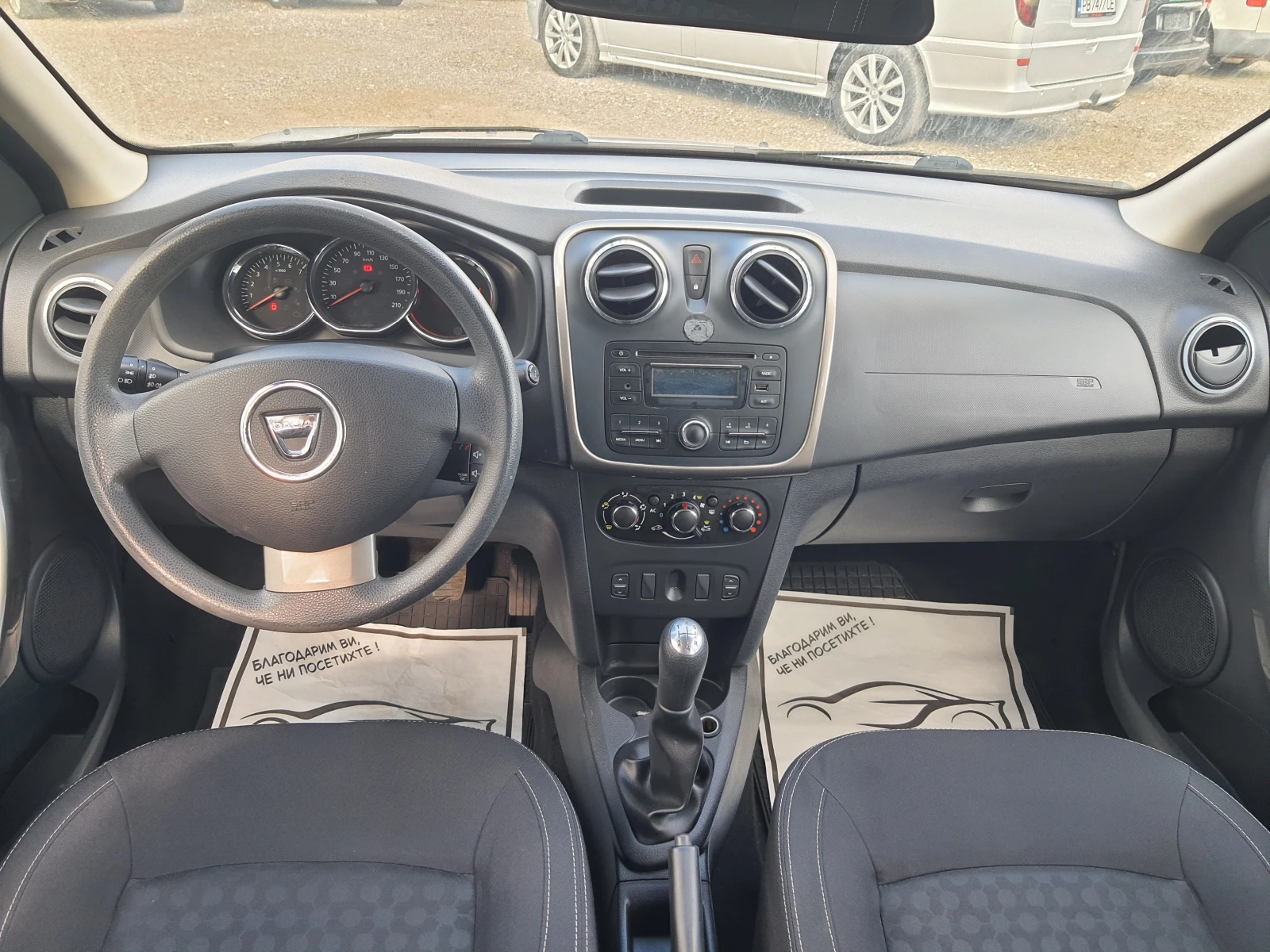 Dacia Logan 1.2i, снимка 11 - Автомобили и джипове - 56110604