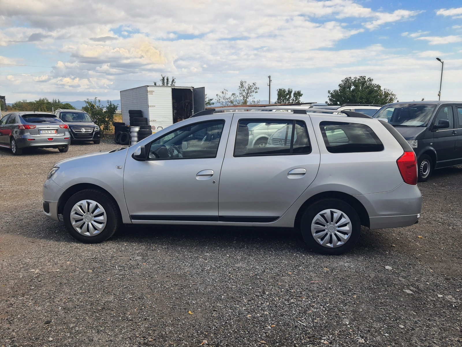 Dacia Logan 1.2i, снимка 7 - Автомобили и джипове - 56110604